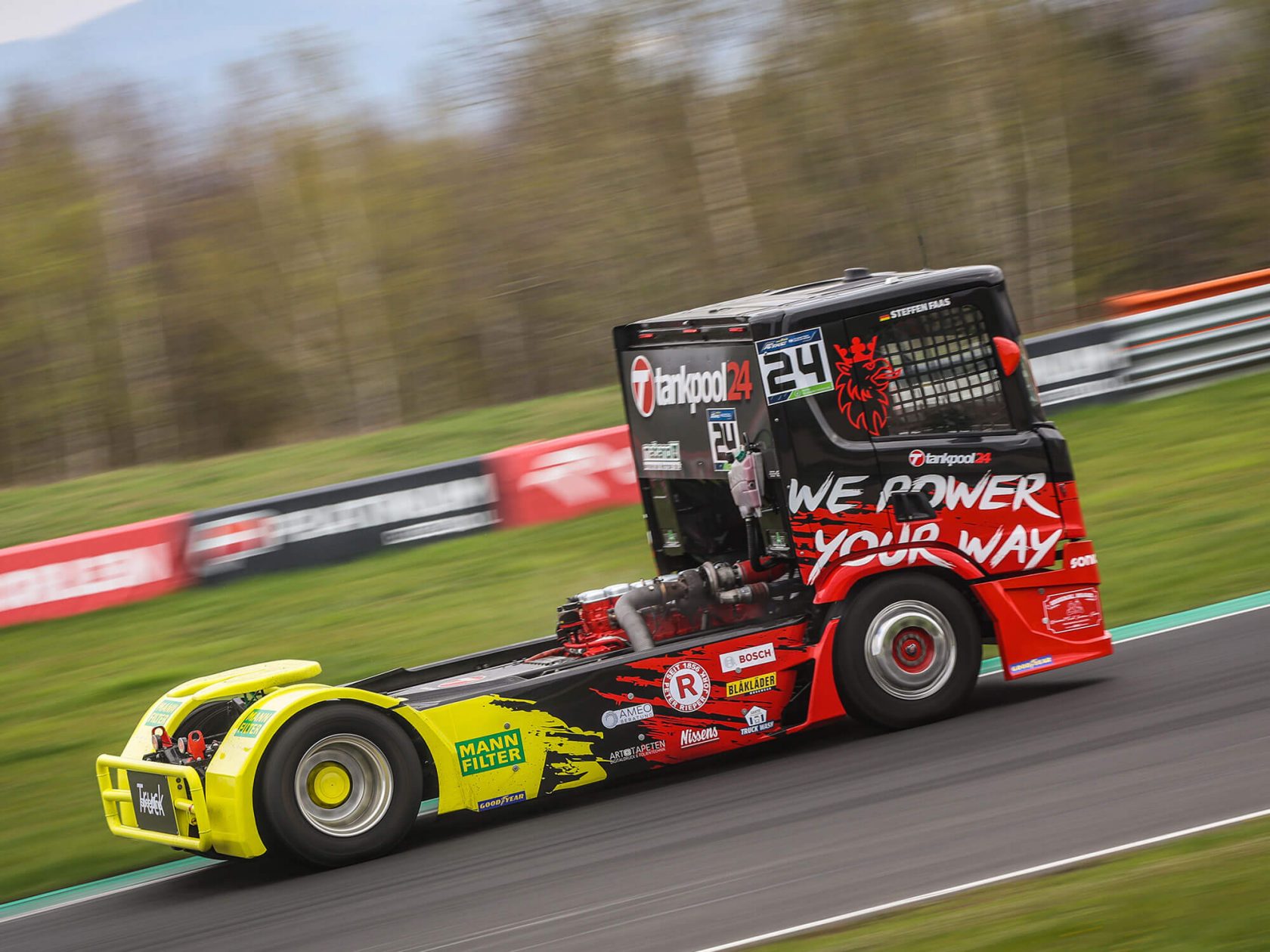 MANN-FILTER racing truck in action on the race track