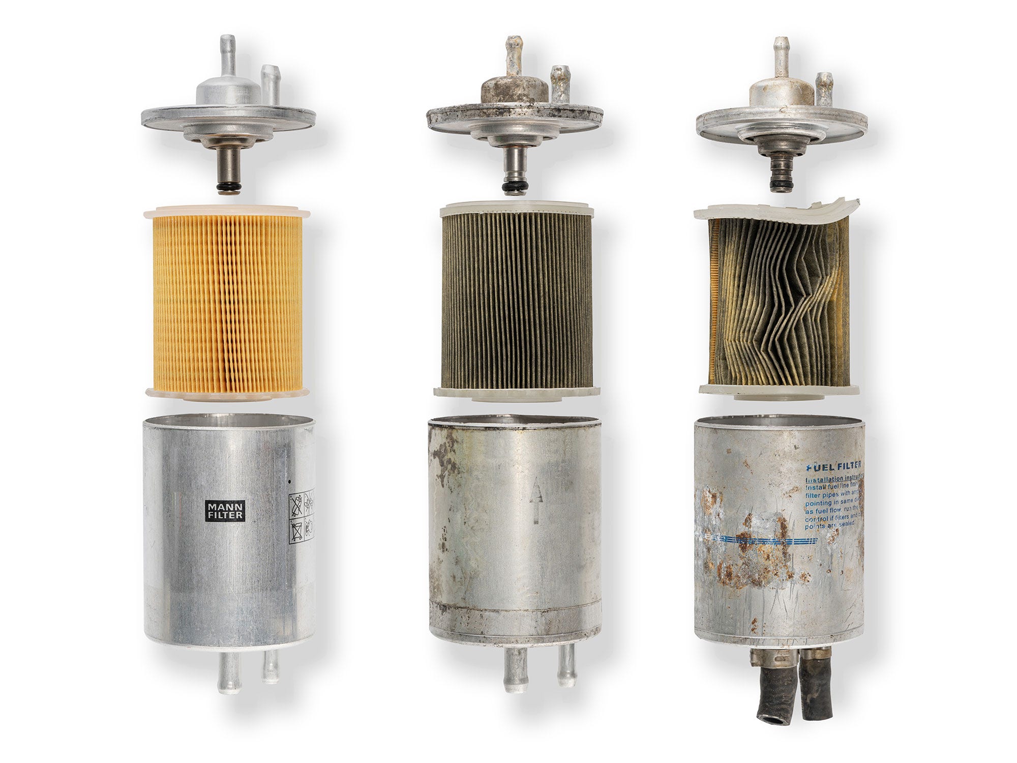 Comparison of high-quality and low-quality fuel filter (left to right: new MANN-FILTER, used OE-FILTER, used low-quality filter) Testing fuel filters: big differences