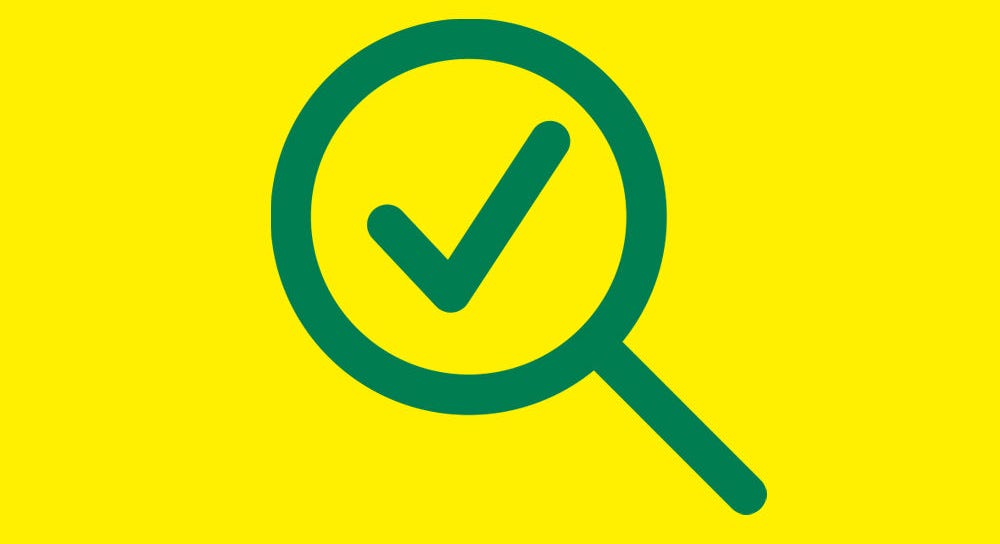 Green pictogram showing a magnifying glas with checkmark on a yellow background