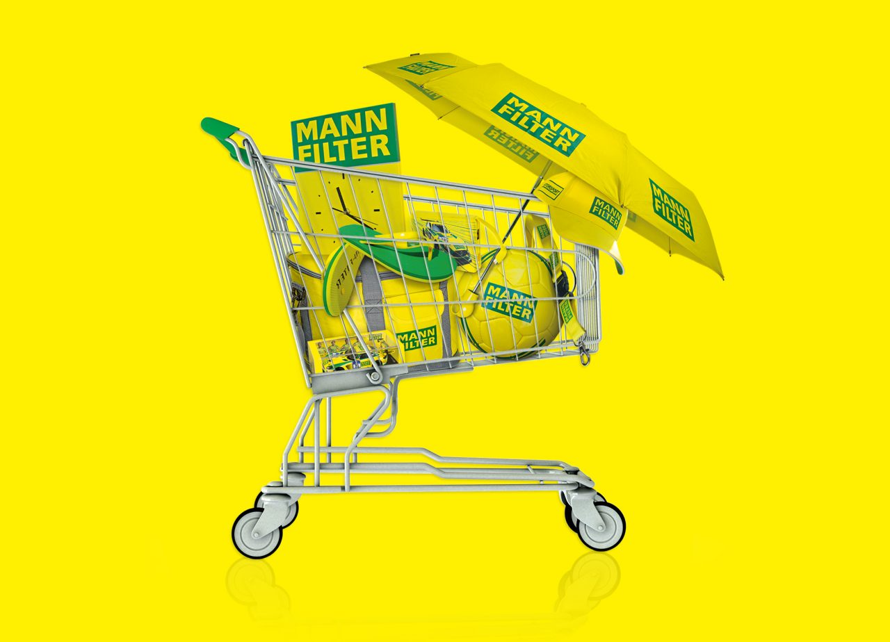 Jede Menge gelb-grüne Fan-Artikel im MANN-FILTER Fan Shop