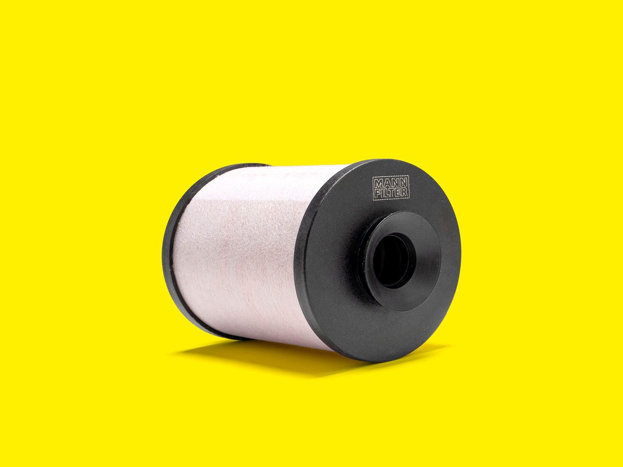 A white air oil separator filter with a black base, for material handling machines